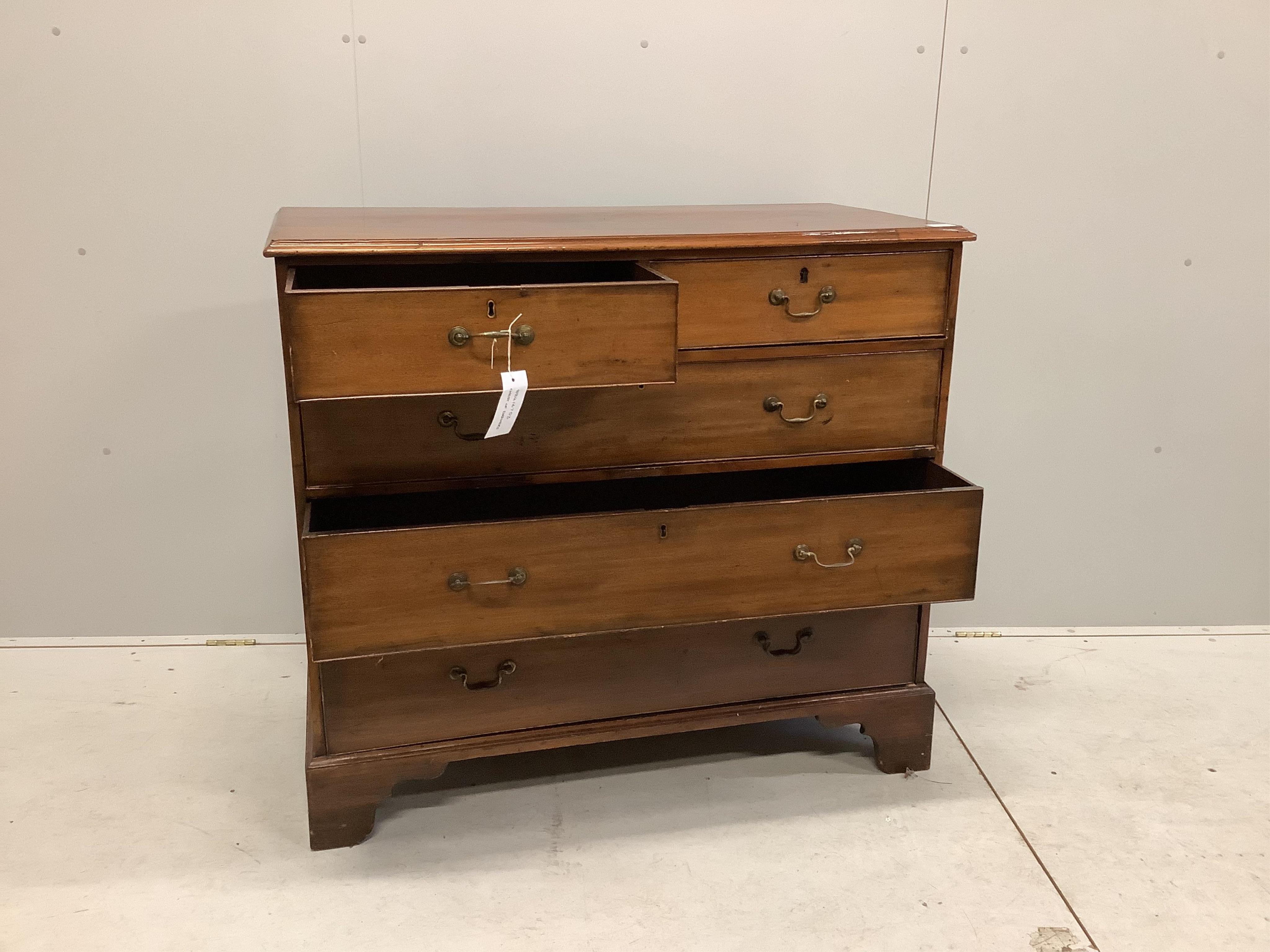 A George III mahogany chest of two short and three long drawers on bracket feet, width 114cm, depth 56cm, height 101cm. Condition - fair